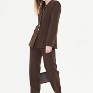 Woman wearing a brown suit