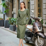 Woman in a green outfit