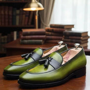 Green leather loafers