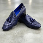 Blue loafers with tassels
