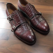 Brown leather shoes with buckle details