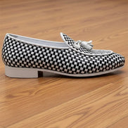 Black and white checkered loafers with a tassel