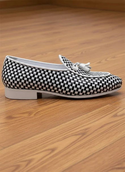 Black and white checkered loafers with a tassel