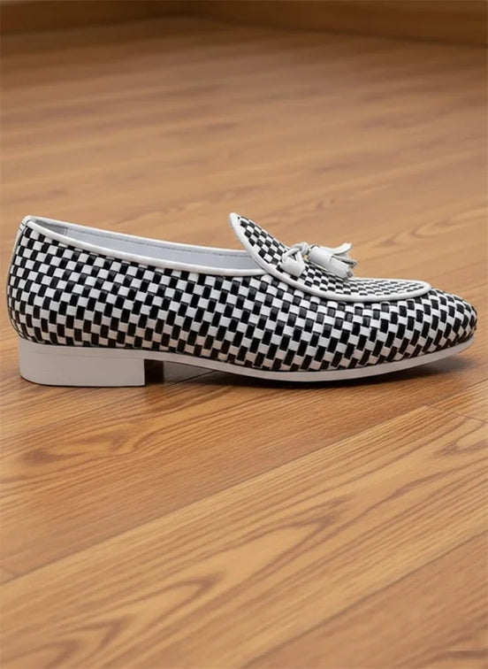 Black and white checkered loafers with a tassel