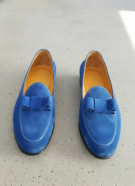 Blue loafers with bow details
