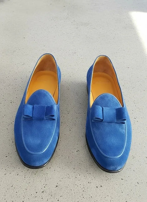 Blue loafers with bow details
