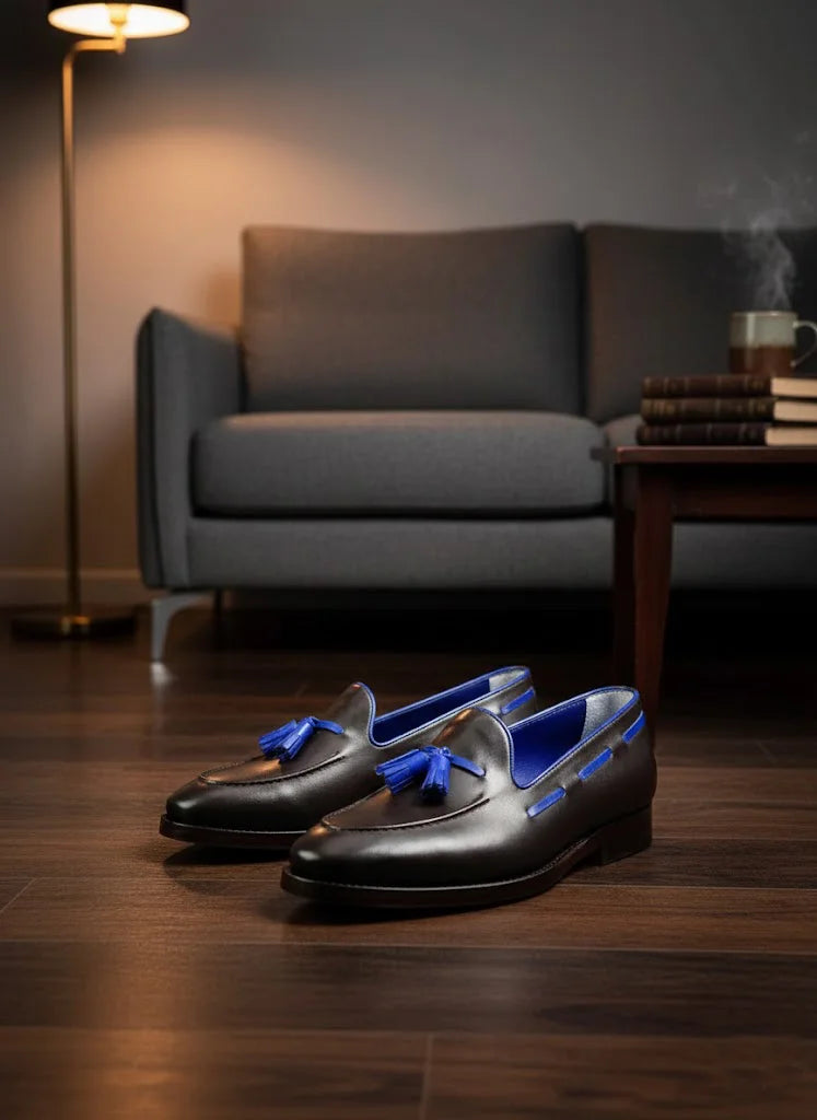 Black loafers with blue accents