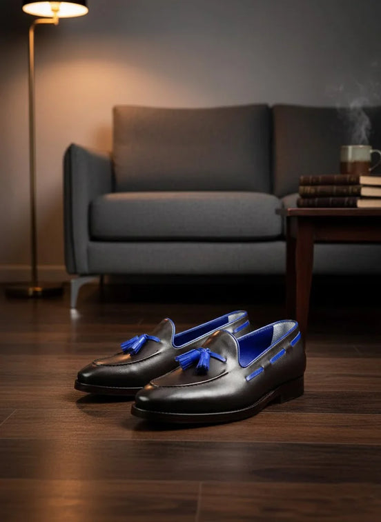 Black loafers with blue accents