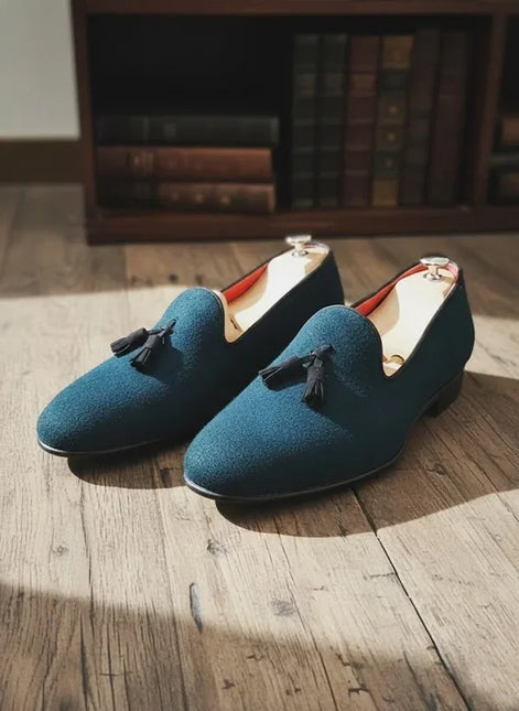 Blue loafers with tassels