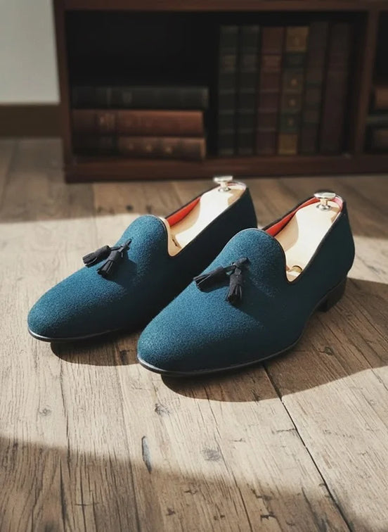 Blue loafers with tassels
