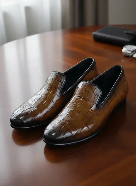 Brown crocodile-patterned loafers