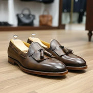 Brown leather loafers with tassels