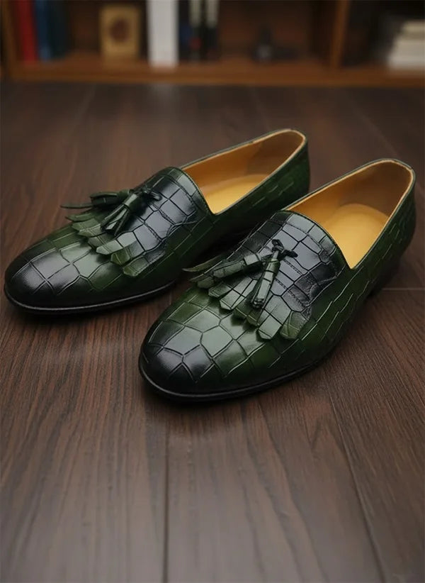 Green leather loafers with tassels
