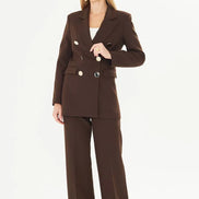 Woman wearing a brown suit