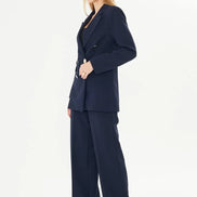 Woman wearing a navy suit