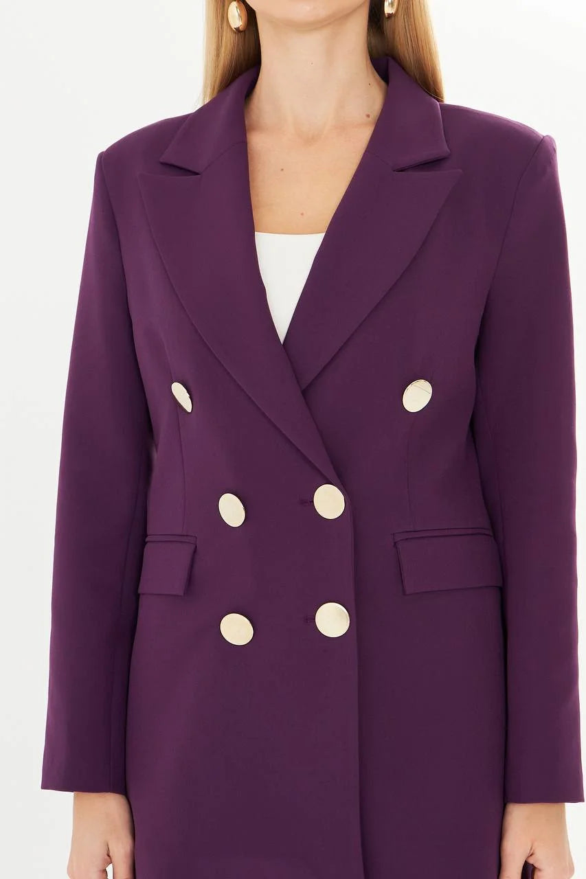 Purple suit with gold buttons on