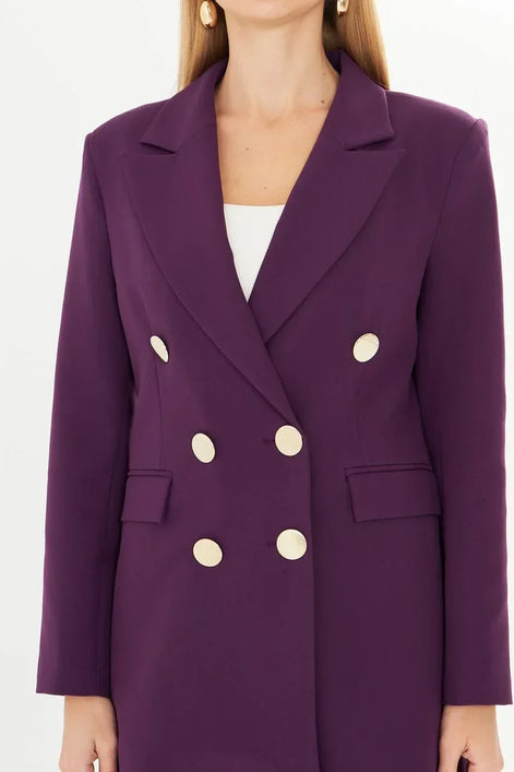 Purple suit with gold buttons on