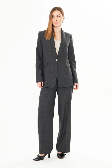 Woman wearing a gray suit