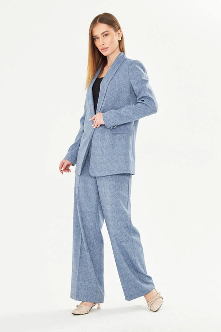 Woman wearing a light blue suit