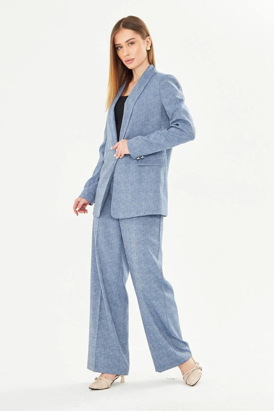 Woman wearing a light blue suit