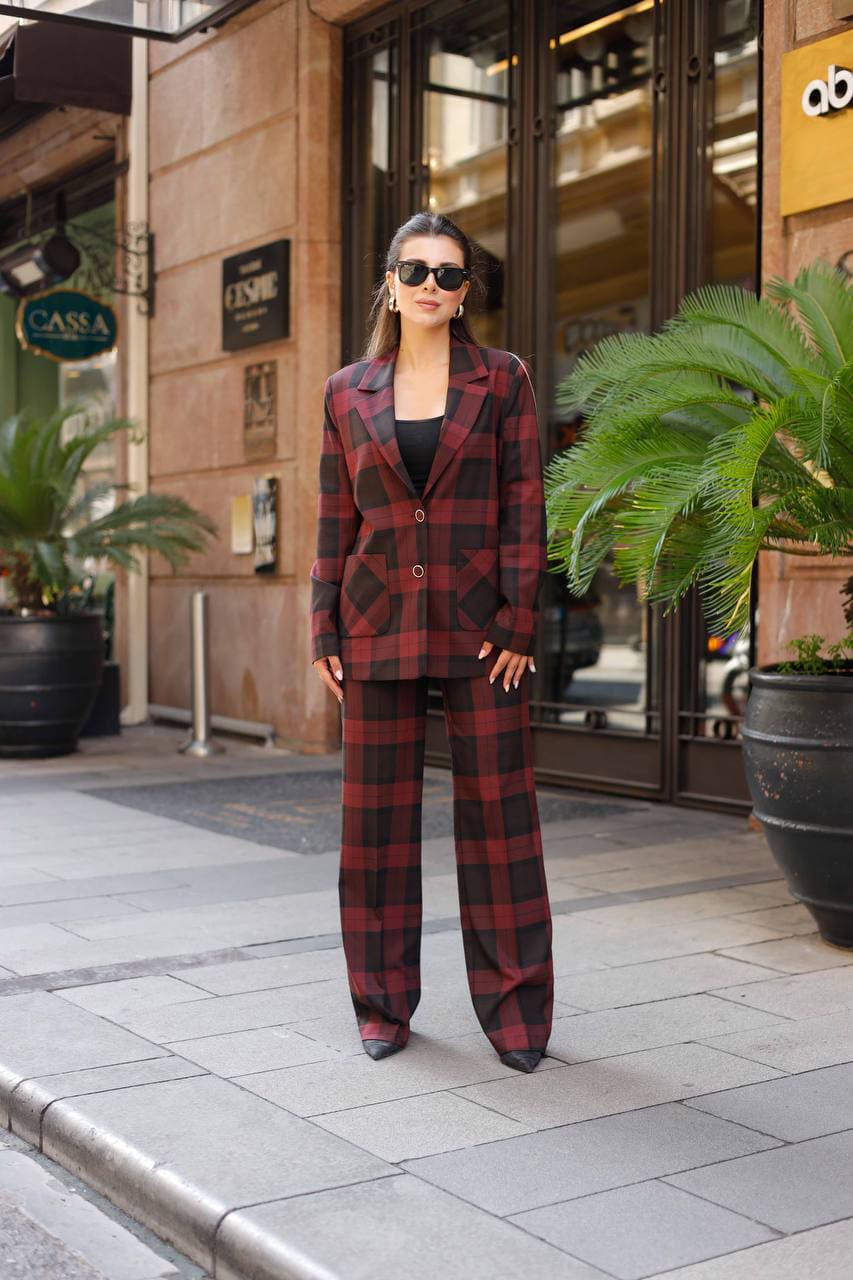 Woman in a red plaid suit 