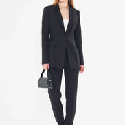 Woman wearing a black suit