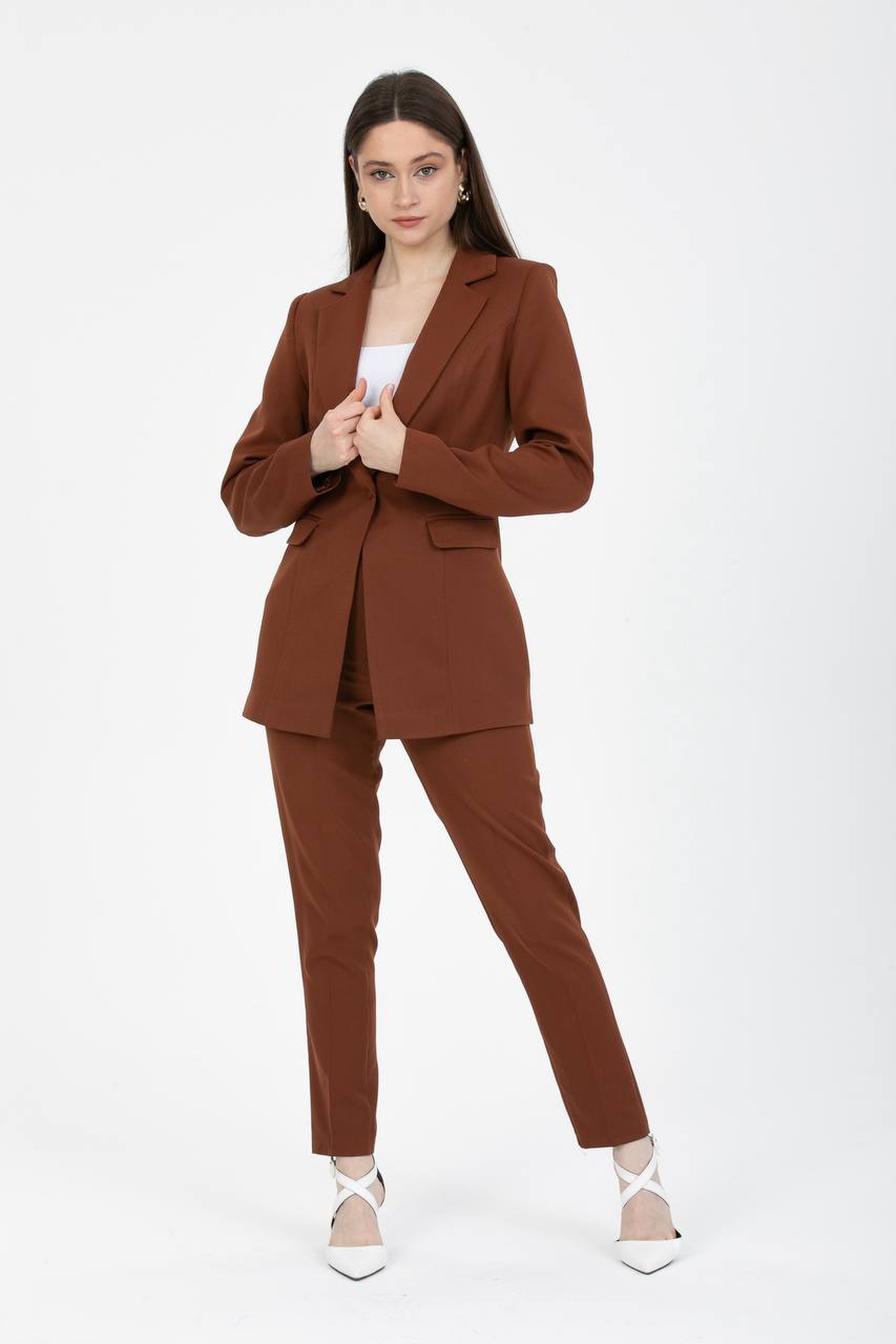 Woman wearing a brown suit