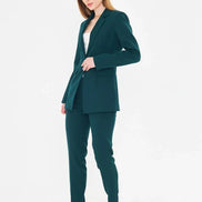 Woman wearing a green suit