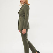 Woman wearing a green suit