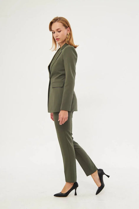 Woman wearing a green suit