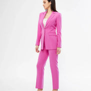 Woman wearing a bright pink suit 