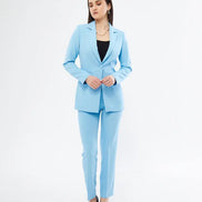 Woman wearing a light blue suit