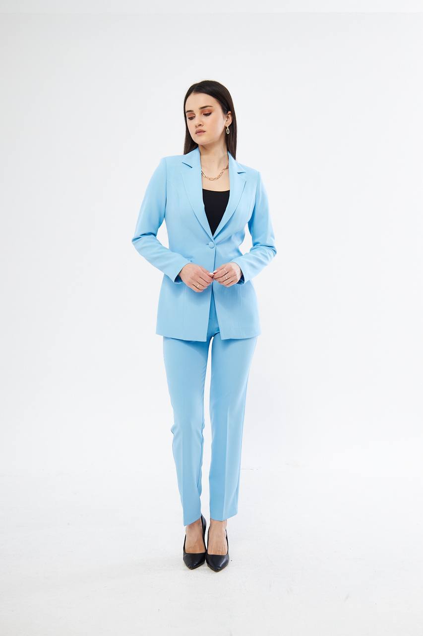 Woman wearing a light blue suit