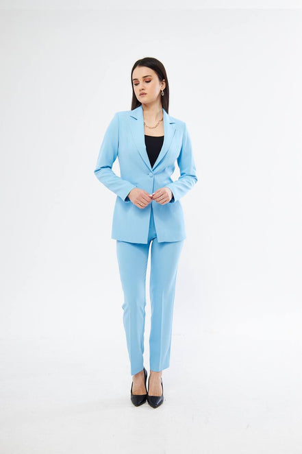 Woman wearing a light blue suit
