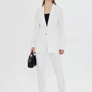 Woman wearing a white suit