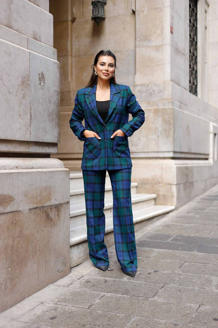 Woman in a blue plaid suit