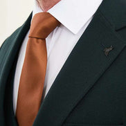 Man wearing a dark green suit