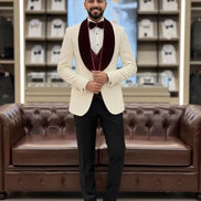 white suit with a red vest