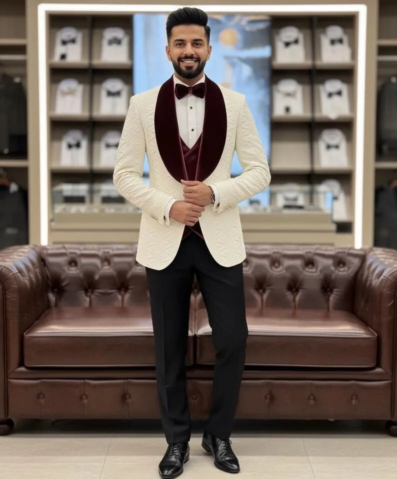 white suit with a red vest