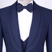 Navy blue tuxedo with a bow tie