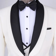 White tuxedo with black lapels and bow tie