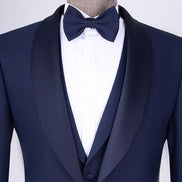 Navy blue tuxedo with a bow tie