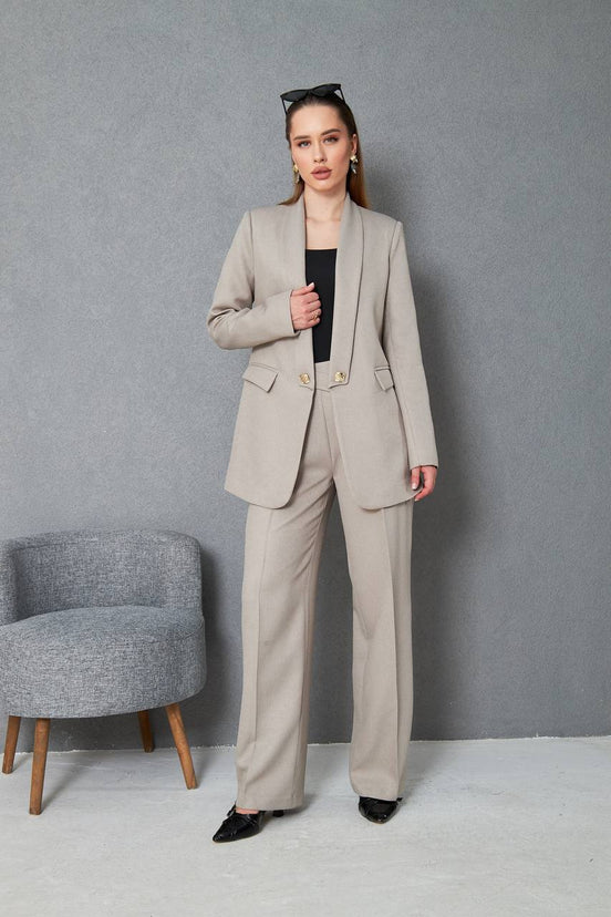 Woman in a beige suit