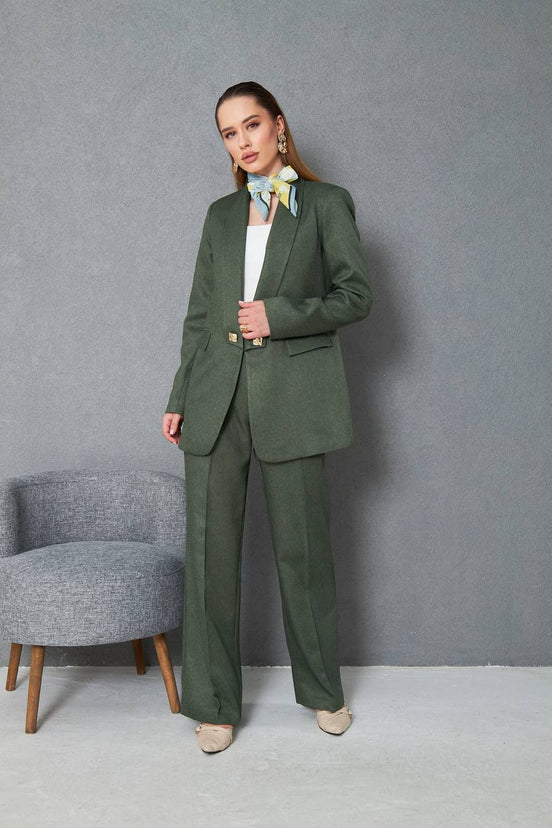 Woman wearing a green suit