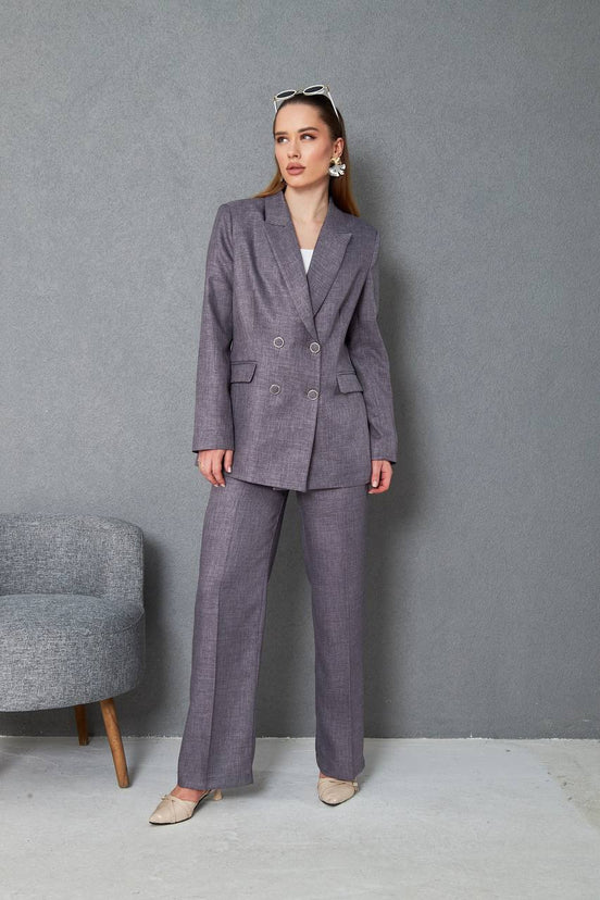 Woman wearing a gray suit