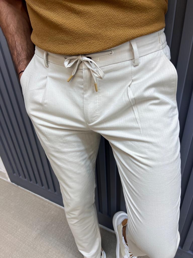 Regular Fit Linen trousers - Cream - Men | H&M IN