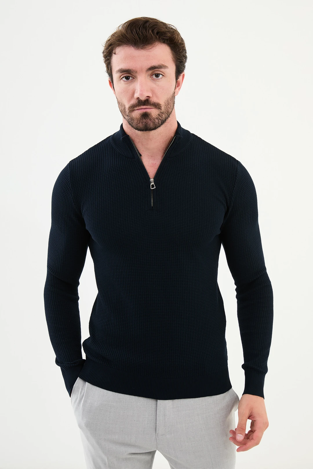 men in navy blue zip neck wool sweater